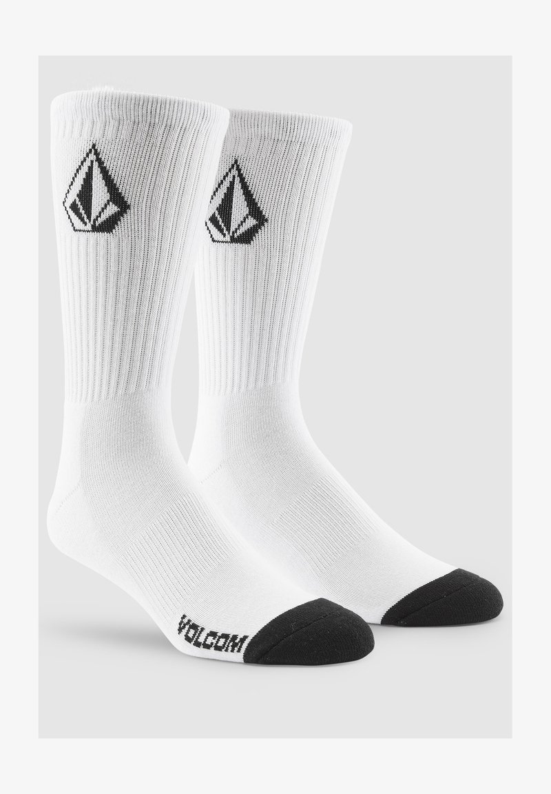 White cotton socks with ribbed texture, black toe caps, and a black logo diamond design on the sides.