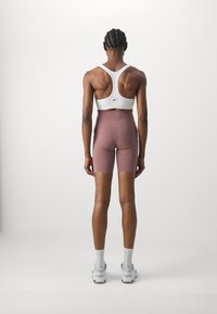Nike Performance UNIVERSA SHORT - Leggings - smokey mauve
