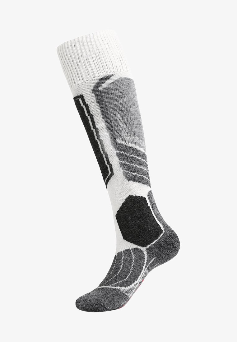 Calcetines hasta la rodilla con un diseño en gris y blanco que presenta formas hexagonales, rayas y patrones texturizados. Están hechos de un material suave y elástico.