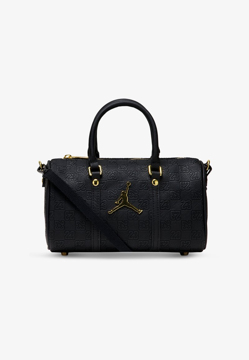 Melnā teksturētā somiņa ar zelta aparatūru, mīkstiem rokturiem, regulējamu siksnu un izteiktu Jumpman logo uz priekšpuses.
