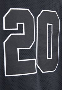 Black sports jersey with a large white number "20" prominently displayed, featuring breathable mesh fabric and a textured surface.