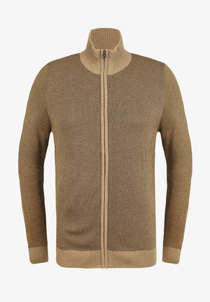 Brauner Zip-Pullover mit einem strukturierten Strickmuster, hohem Kragen und gerippten Bündchen. Frontreißverschluss mit passendem Stoffbesatz.