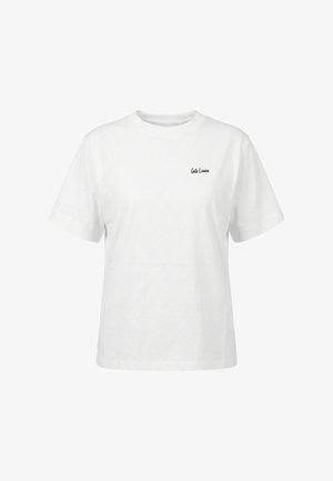 T-shirt blanc à manches courtes et col rond avec un petit texte noir "Gute Laune" sur le côté gauche de la poitrine, présenté sur un fond blanc uni.