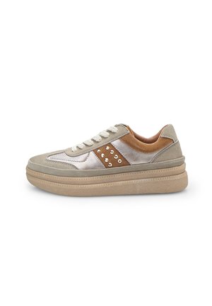 Sneaker with a beige suede upper, metallic silver accents, and brown leather details. Features textured rubber sole and decorative studs.