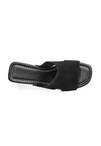 Black slide sandal made of suede with a wide upper strap, rectangular toe shape, and contrasting white stitching along the sole.