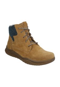 Beżowe zamszowe botki za kostkę z wyściółką z niebieskiego kordurowego materiału, lekką gumową podeszwą i metalowymi oczkami na sznurówki. Ze subtelnym detalem w postaci przeszyć.