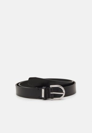 Black leather belt coiled with silver metal D-shaped buckle on plain white background.