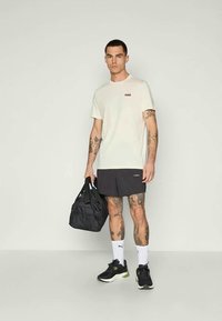 Puma COLOR SMALL LOGO TEE - Paprasti marškinėliai - no dye