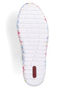 White shoe sole with textured ridges and colorful paint splatter in blue, red, and yellow along the edges; features a central logo.