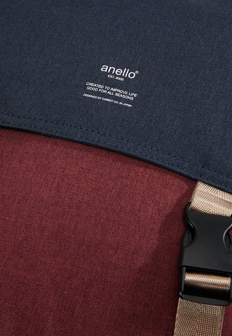 anello slim flap backpack