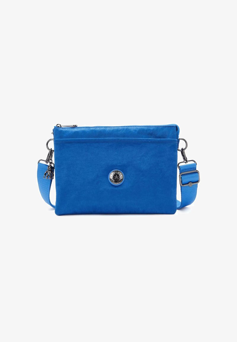 Blue crossbody bag made of durable fabric, featuring a zip closure, adjustable strap, and a round silver logo detail on the front.
