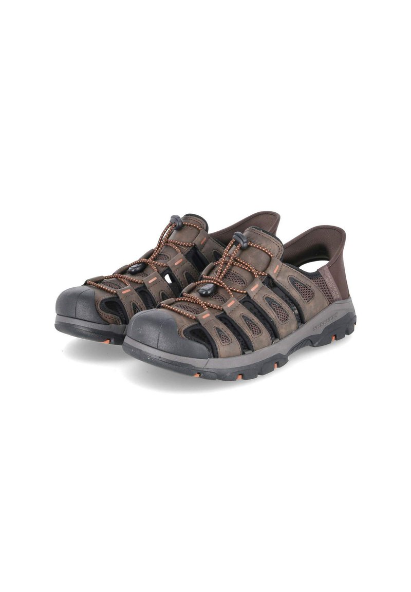 Brown outdoor sandals featuring breathable mesh panels, elastic laces, rubber toe caps, and textured soles with orange accents.