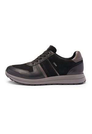 Black sneakers featuring a combination of leather and suede materials, with a textured sole and subtle brown accents on the sides.