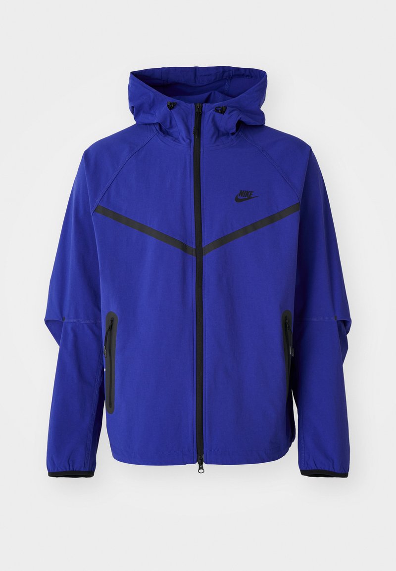 Nike Sportswear Lichte jas paars Nike Sportswear Lichte jas paars