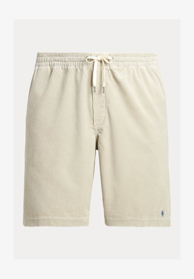 Μπεζ βερμούδα από κορντόρε με κάθετες ρίγες, ελαστική μέση, κορδόνι σύσφιξης και μικρό κεντημένο λογότυπο στο κάτω μέρος.