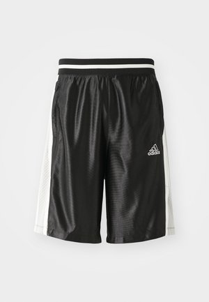 Calções de desporto pretos com uma textura suave, cintura elástica com riscas brancas e painéis laterais em malha para respirabilidade. Logótipo da Adidas presente.