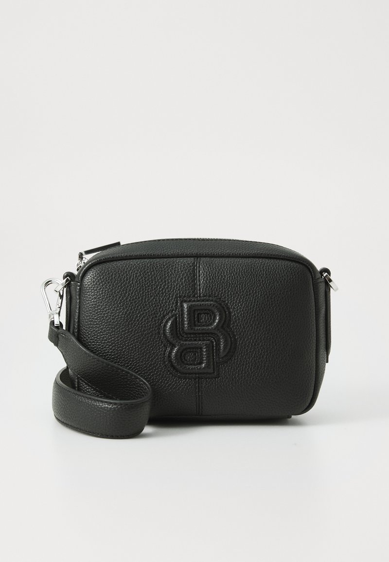 Black leather crossbody bag with a textured finish, rectangular shape, and embossed logo on the front. Features a detachable strap and zipper.