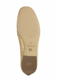 Tan shoe sole with textured, anti-slide pattern and a natural woven design on the sides. The size "37" is embossed near the heel.