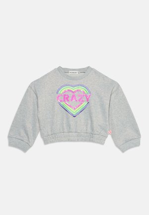 Graues cropped Sweatshirt mit langen Ärmeln, buntem Herzdesign und dem Wort "CRAZY" in pinken Pailletten auf der Vorderseite.