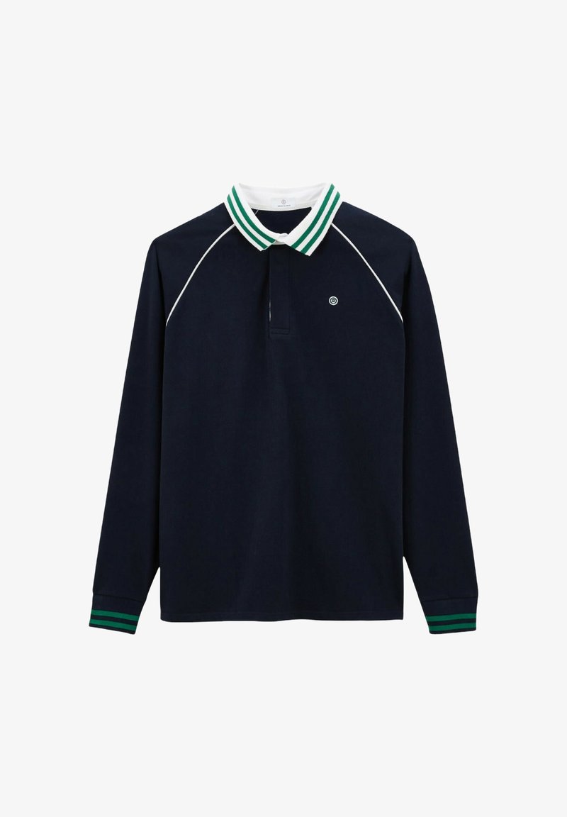 Polo à manches longues navy avec col rayé blanc et vert. Présente des manches raglan et un petit logo sur la poitrine. Tissu en coton doux.