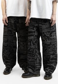 Wasted Paris - MIND CASPER UNISEX - Platūs džinsai - black Miniatiūros vaizdas 1