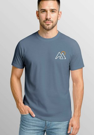 Short-sleeve grey t-shirt features a small white and orange mountain logo on the left chest, made of soft fabric with a smooth texture.
