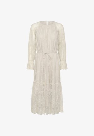 Robe midi en dentelle ivoire avec manches longues bouffantes transparentes, encolure ronde, ceinture à la taille et ourlet à volants.