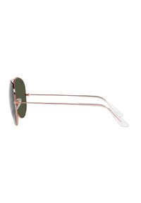 Occhiali da sole circolari con montatura in metallo dorato, lenti verde scuro e sottili aste argentate con punte trasparenti. Presentano un design unico con barra sopraccigliare.