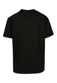 Black cotton t-shirt with a crew neck and short sleeves. Features a clean, smooth texture and a relaxed fit. No visible logos or patterns.