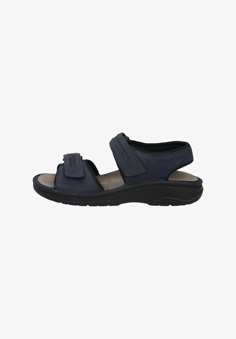 Dark blue sandal with two adjustable straps, suede-like upper, contoured footbed, and black rubber sole for traction. Flat design for comfort.