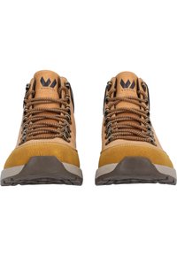 Brown leather hiking boots with yellow suede accents, metal eyelets, and rubber soles. Features thick laces and drainage holes.