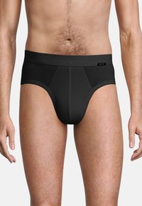 Zwarte herenboxershort van soepel materiaal, met een hoge tailleband, een contourfront en platte naden voor comfort en ondersteuning.