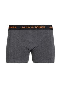 Grijze boxershorts van zacht materiaal met een zwarte tailleband waarop de merknaam "JACK & JONES" in oranje letters staat.
