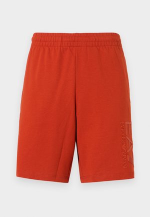 Rode katoenen shorts met een elastische tailleband. Heeft een bedrukt logo op het linkerpoot. Vloeiende textuur, lengte boven de knie.