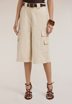 BERMUDA - Shorts - beige