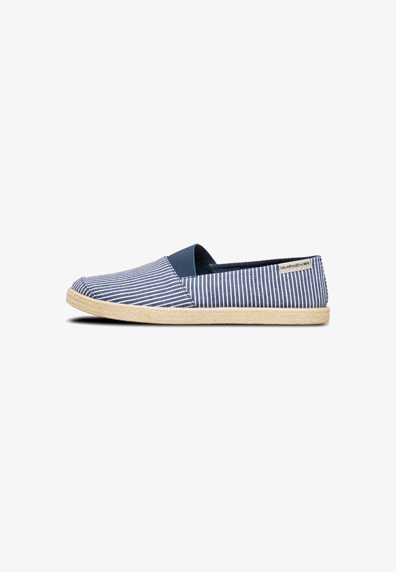 Blue and white striped canvas slip-on shoe with a rubber sole and jute trim. Features a rounded toe and elastic side panels for easy wear.