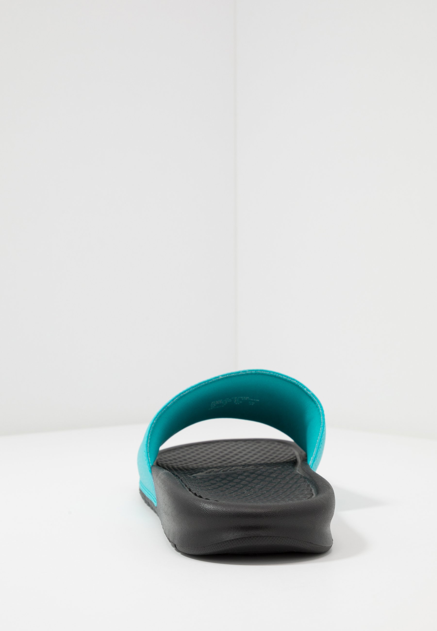 green and black nike slides