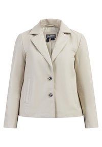 Beige leren jekker met een uitsnijding voor de kraag, enkelvoudige sluiting, twee voorkussens en donkere knopen. Glad textuur en getailleerde silhouet.