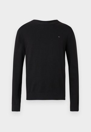 Black long-sleeve crewneck sweater with small red, white, and blue logo on the upper left chest, displayed against a plain background.