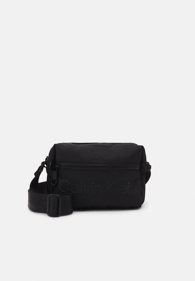 Calvin Klein CODE CAMERA BAG Across body bag black Zalando.de