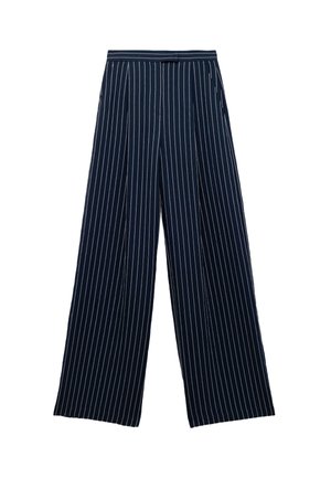Pantalons larges en bleu marine avec des rayures blanches verticales, présentant un devant plissé et une taille lisse. Le matériau semble doux.