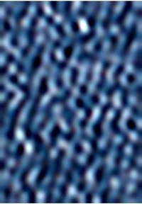 Tissu en bleu texturé présentant un mélange de teintes plus foncées et plus claires dans un motif aléatoire. Le matériau semble doux avec une finition légèrement brillante.