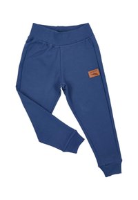 Blaue Sweatpants aus weichem Stoff, mit einem gerippten Bund und Bündchen, verziert mit einem braunen Lederpatch an der Seite.