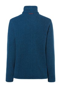 Pullover in pile blu con colletto alto, tessuto testurizzato e maniche lunghe. Presenta un sottile motivo melangiato e un accento logo sul retro.