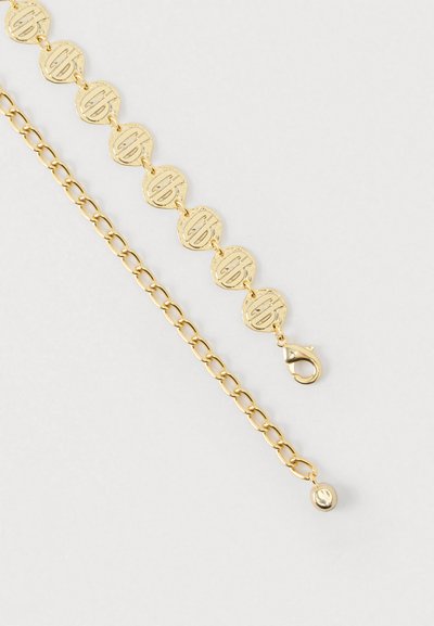 Βραχιόλι σε χρυσό τόνο με κυκλικά μεταλλικά συνδεσμικά στοιχεία με ανάγλυφο λογότυπο, ένα τμήμα αλυσίδας και κλείσιμο με γαρίδα.