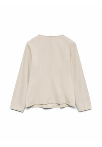 Veste beige à manches longues avec des coutures apparentes, vue de dos sur un fond blanc.