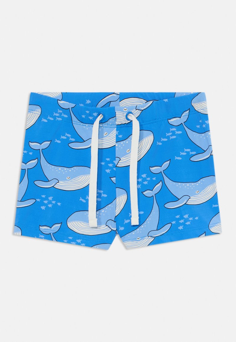Blå badshorts med ett valmönster, försedda med vita dragsnören. Tyget är slätt med en lekfull design av valar och fiskar.
