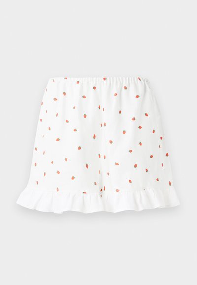 Biele šortky s malými červenými potlačami jahôd, s volánovým lemom a elastickým pásom pre pohodlie. Vyrobené z ľahkej tkaniny.