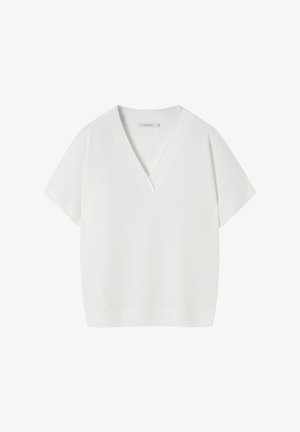 Witte v-hals korte mouwen top met een relaxte pasvorm. Kenmerkt zich door een geribde halslijn en details aan de zijnaad, gemaakt van een zachte stof.