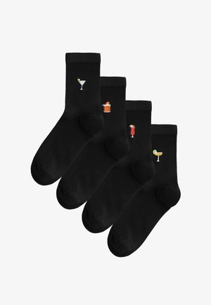 Schwarze Baumwollsocken mit bestickten Cocktailmotiven: ein Martini, ein Cocktailglas und zwei farbenfrohe Getränkedarstellungen.